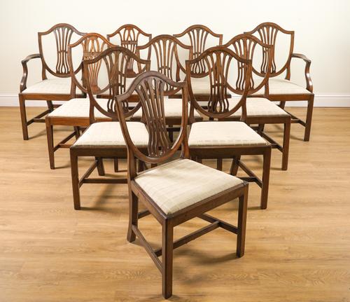 A MATCHED SET OF EIGHT GEORGE III AND LATER MAHOGANY SHIELD BACK DINING CHAIRS (8)
