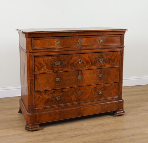 A 19TH CENTURY FRENCH WALNUT FOUR DRAWER COMMODE