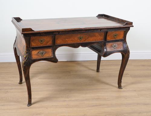 A 19TH CENTURY MALTESE INLAID WALNUT AND ROSEWOOD WRITING DESK WITH BOMBE FIVE DRAWER FRIEZE