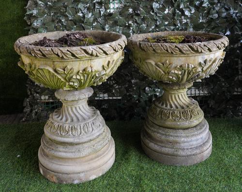A PAIR OF RECONSTITUTED STONE LEAF MOULDED JARDINIERES (2)