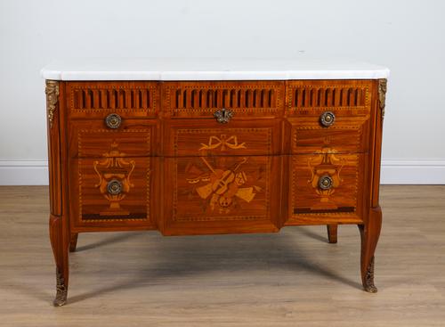 A LOUIS XVI STYLE GILT METAL MOUNTED MARQUETRY INLAID WALNUT AND KINGWOOD MARBLE TOP COMMODE
