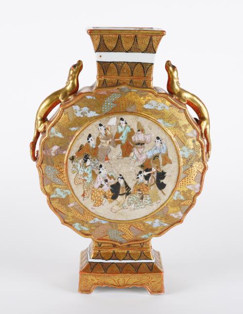 A JAPANESE KUTANI TWO-HANDLED VASE