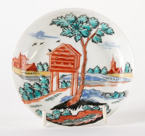 A CHINESE PORCELAIN DUTCH-DECORATED SAUCER