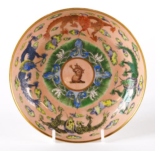 A CHINESE EXPORT CRESTED SAUCER