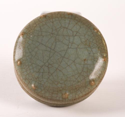 A CHINESE CELADON GLAZED CIRCULAR SHALLOW BOX AND COVER (2)