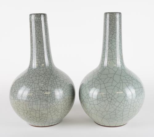 A PAIR OF CHINESE CELADON-GROUND BOTTLE VASES (2)