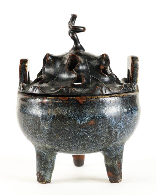 A CHINESE STONEWARE TRIPOD CENSER