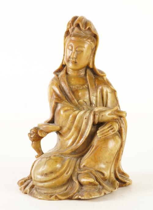 A CHINESE SOAPSTONE FIGURE OF GUANYIN