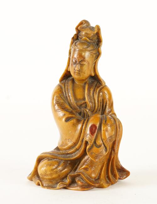 A CHINESE SOAPSTONE FIGURE OF GUANYIN