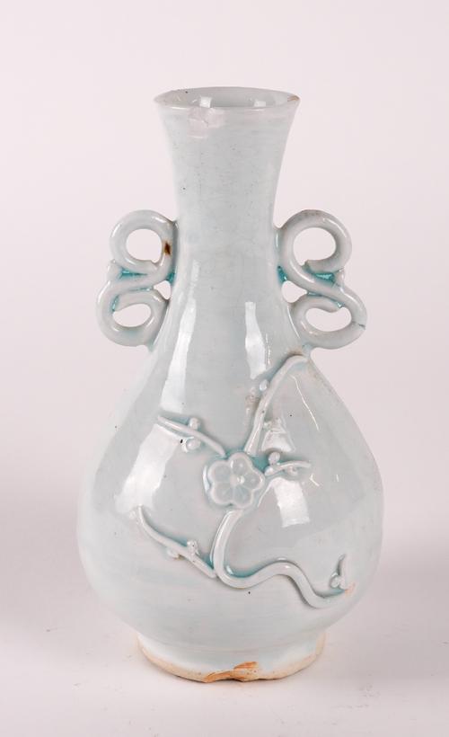 A CHINESE QINGBAI TWO-HANDLED VASE