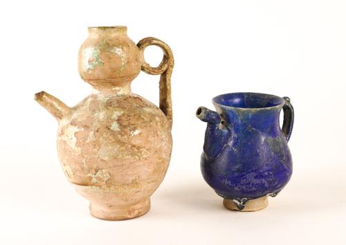 TWO GLAZED POTTERY EWERS (2)