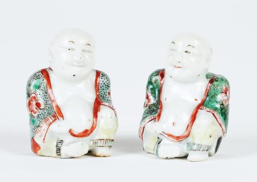 AN UNUSUAL PAIR OF CHINESE PORCELAIN MINIATURE FIGURES OF BOYS (2)
