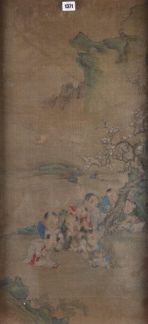 A CHINESE PAINTING OF MEN AND BOYS GATHERED AROUND THE BASE OF A PRUNUS TREE