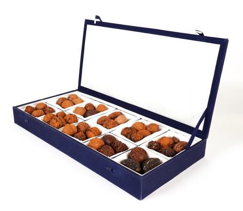 A GROUP OF CHINESE CARVED NUTS