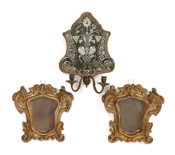 A FRENCH MIRROR-BACKED WALL SCONCE AND TWO GILTWOOD FRAMED MIRRORS (3)