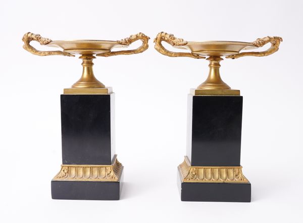 A PAIR OF FRENCH ORMOLU AND BLACK MARBLE TAZZE (2)