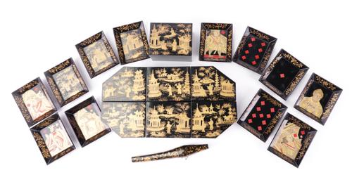 A SET OF CHINESE-EXPORT GILT LACQUER DECORATED GAMING BOXES AND MATCHING PLAYING CARD TRAYS (QTY)