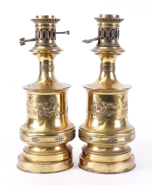 A PAIR OF EDWARDIAN BRASS TABLE OIL LAMPS ADAPTED FOR ELECTRICITY (2)