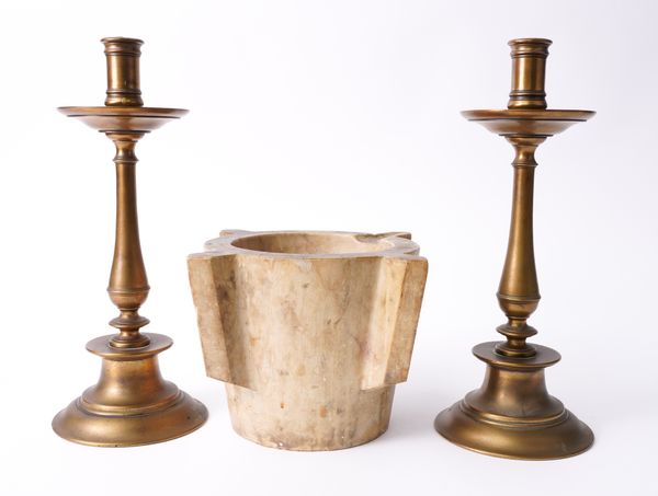 A PAIR OF NORTH EUROPEAN BRONZE CANDLESTICKS (3)