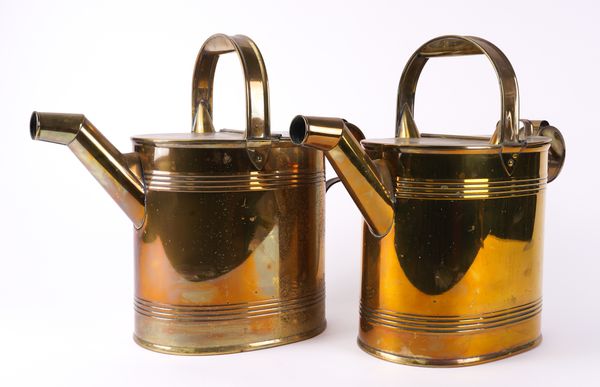 A PAIR OF VICTORIAN BRASS OVAL HOT WATER CANS (2)