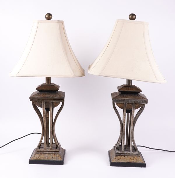 A PAIR OF SILVERED AND GILT DECORATED METAL TABLE LAMPS