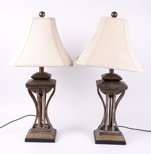 A PAIR OF SILVERED AND GILT DECORATED METAL TABLE LAMPS