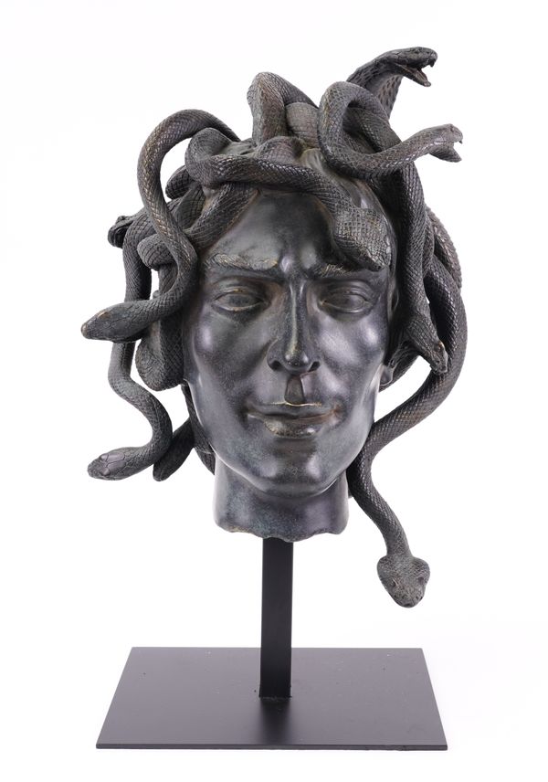 A BRONZE EFFECT RESIN BUST OF MALE MEDUSA