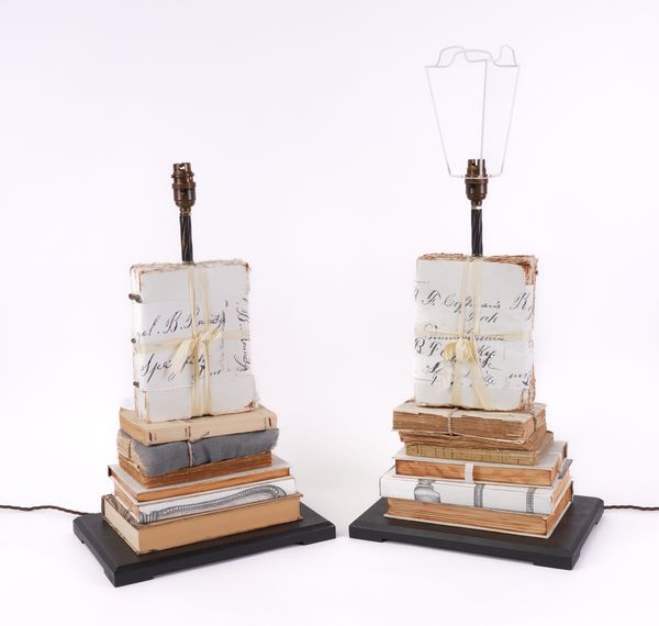 A PAIR OF STRING-TIED BOOK TABLE LAMPS (2)