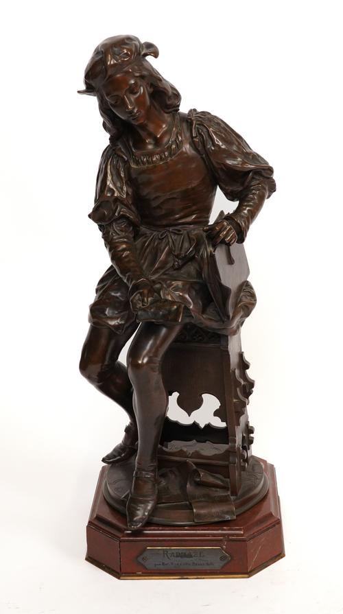 HIPPOLYTE FRANCOIS MOREAU (FRENCH 1832-1927): A FRENCH BRONZE MODEL OF THE SEATED ARTIST RAPHAEL