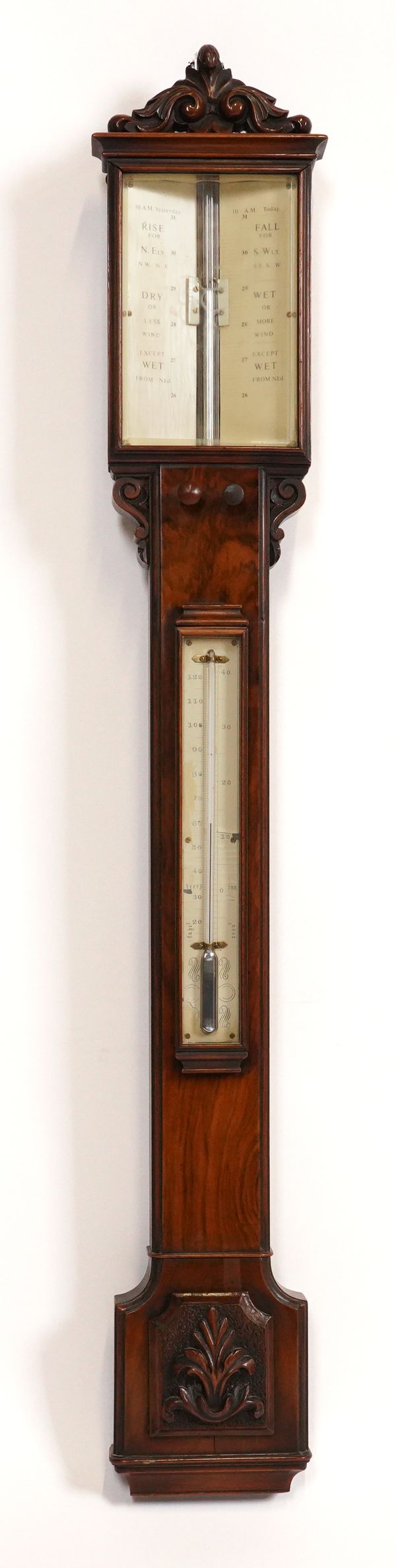 A VICTORIAN WALNUT STICK BAROMETER