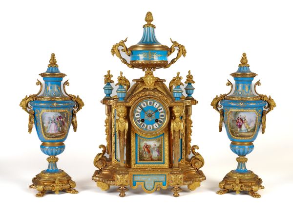 A FRENCH ORMOLU AND BLEU CELESTE SEVRES-STYLE CLOCK GARNITURE