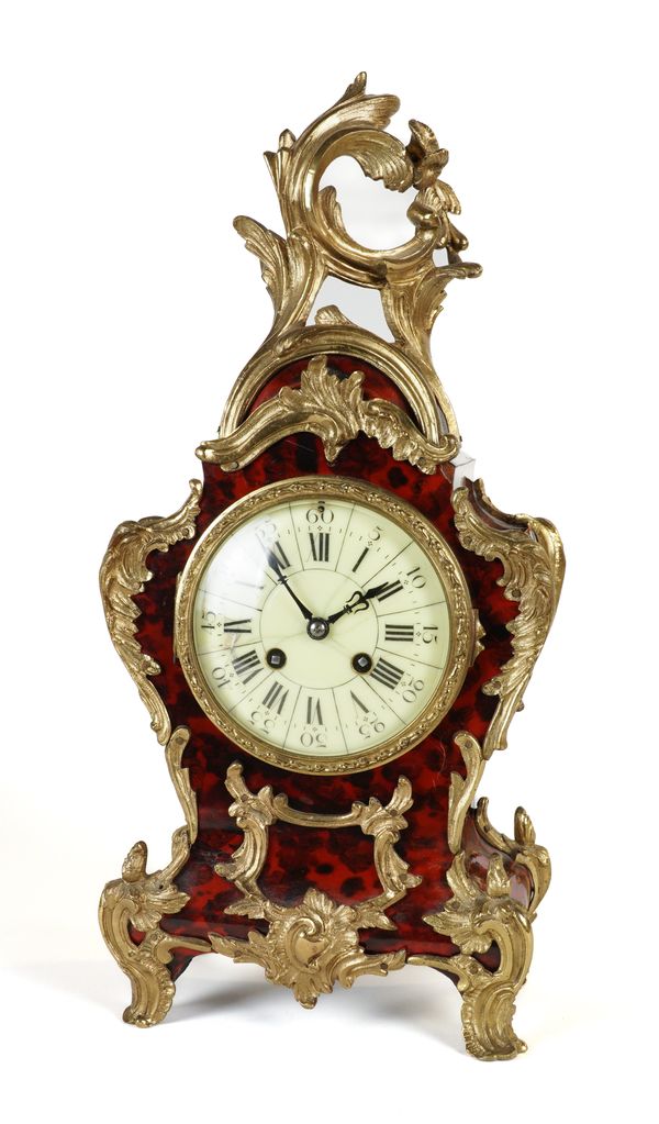 A FRENCH ORMOLU-MOUNTED TORTOISESHELL MANTEL CLOCK