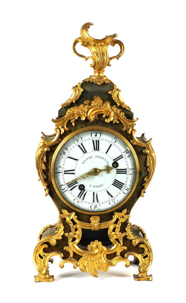 A LOUIS XV ORMOLU-MOUNTED GREEN VELVET COVERED MANTEL CLOCK