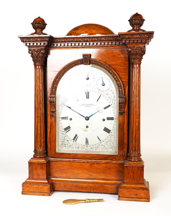 A LARGE LATE VICTORIAN OAK QUARTER CHIMING and REPEATING BRACKET CLOCK