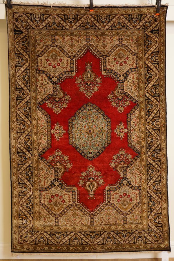 A SILK GHOM RUG, PERSIAN