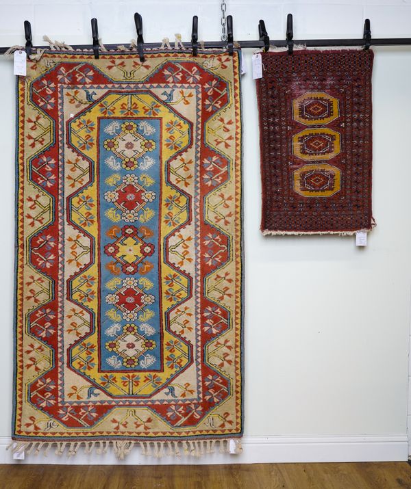 A MODERN KONYA RUG, A PAKISTAN BOKHARA MAT AND A TABRIZ SILK PRAYER RUG (3)