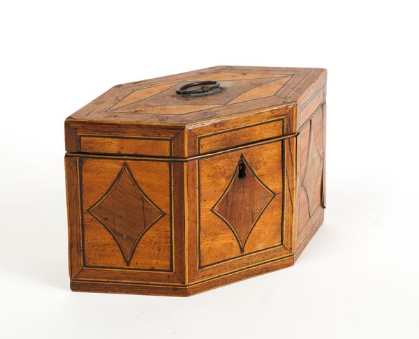 A GEORGE III FRUITWOOD TEA CADDY OF COMPRESSED HEXAGONAL FORM