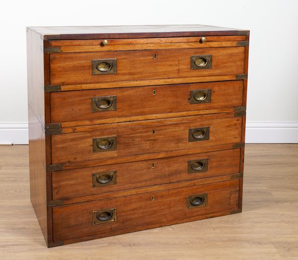 AN EARLY 20TH CENTURY BRASS BOUND TWO SECTION TEAK FIVE DRAWER CAMPAIGN CHEST