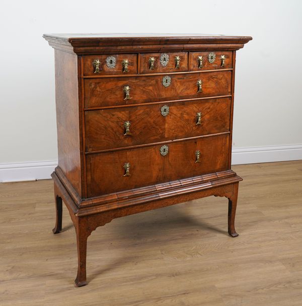 A GEORGE I FIGURED AND BURR WALNUT SIX DRAWERS CHEST OF DRAWERS