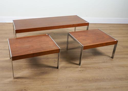 POSSIBLY MERROW AND ASSOCIATES; A SUITE OF THREE 1970S TEAK AND CHROME RECTANGULAR LOW TABLES (3)