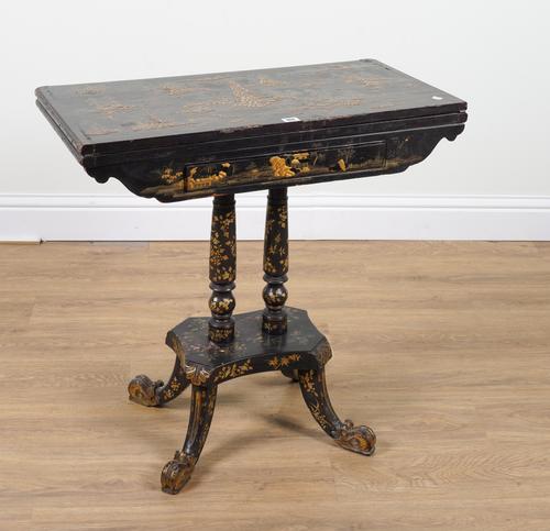 A 19TH CENTURY CHINESE EXPORT LACQUER AND CHINOISERIE DECORATED FOLDOVER CARD TABLE