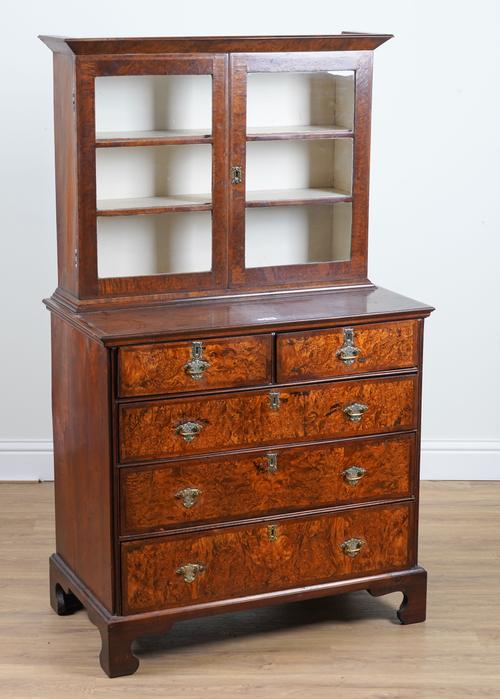 A GEORGE I FEATHER BANDED WALNUT FIVE DRAWER CHEST OF DRAWERS