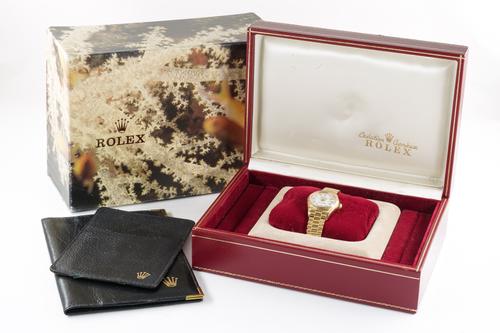 A ROLEX OYSTER PERPETUAL DATE JUST LADY'S 18CT GOLD BRACELET WRISTWATCH