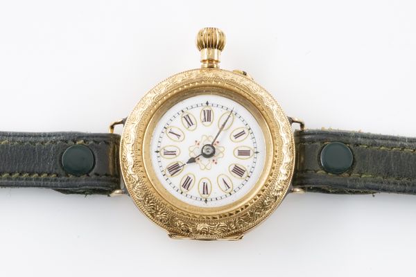 A LADY'S GOLD CASED AND ENAMELLED WRISTWATCH