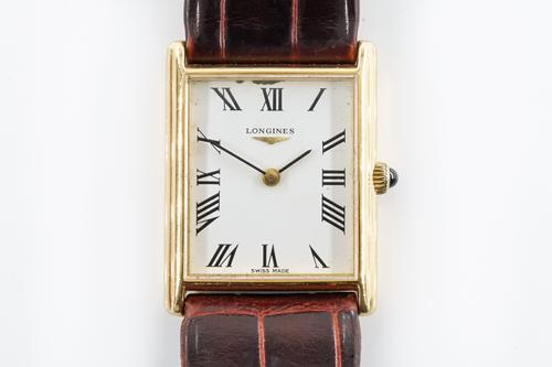 A LONGINES GOLD RECTANGULAR CASED WRISTWATCH