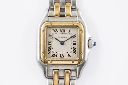 A CARTIER TANK STEEL AND GOLD LADY'S QUARTZ BRACELET WATCH