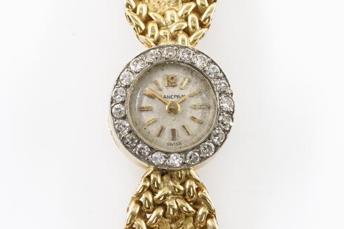 A BLANCPAIN, 18CT GOLD AND DIAMOND SET LADY'S REAR WINDING BRACELET WRISTWATCH