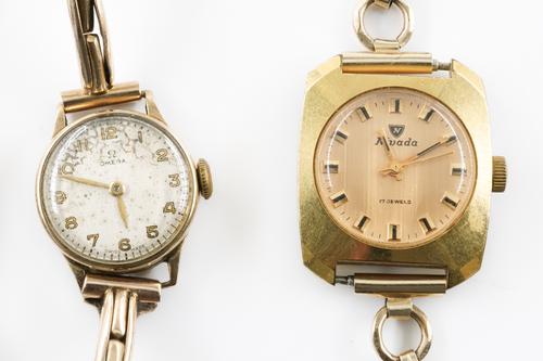 AN OMEGA 9CT GOLD CASED LADY'S WRISTWATCH AND A NIVADA LADY'S WRISTWATCH (2)