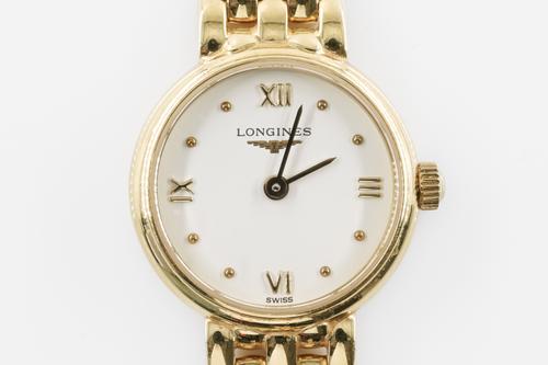 A LONGINES 18CT GOLD LADY'S BRACELET WRISTWATCH