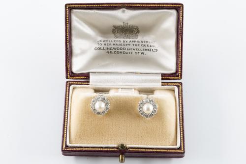 A PAIR OF DIAMOND AND CULTURED PEARL EARRINGS